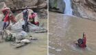 Mergulhadores dos bombeiros durante busca de menino em cachoeira