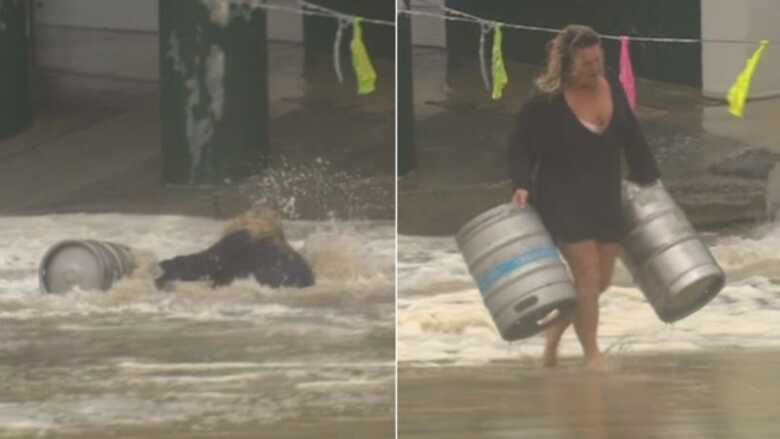 Depois de muita briga contra a maré alta, a mulher conseguiu trazer os barris de volta a terra firme