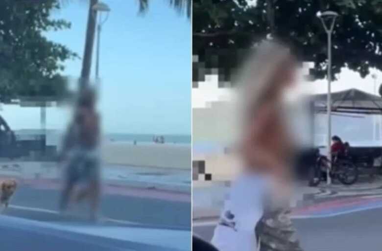 Mulher faz topless ao caminhar com cachorros