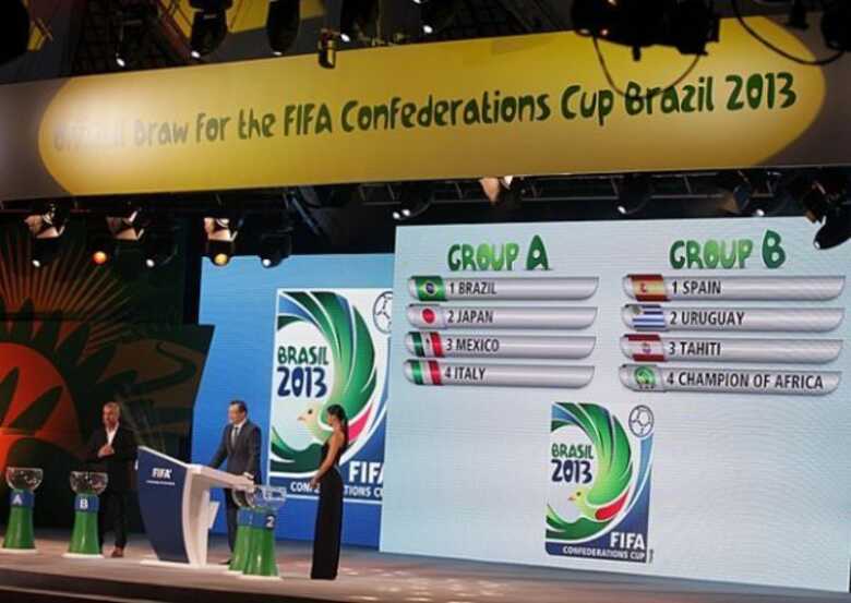 No final, o Brasil ficou no 'grupo da morte' com Japão, México e Itália. No Grupo B ficaram a Espanha, o Uruguai, o Taiti e uma seleção africana que ainda conquistará a vaga.