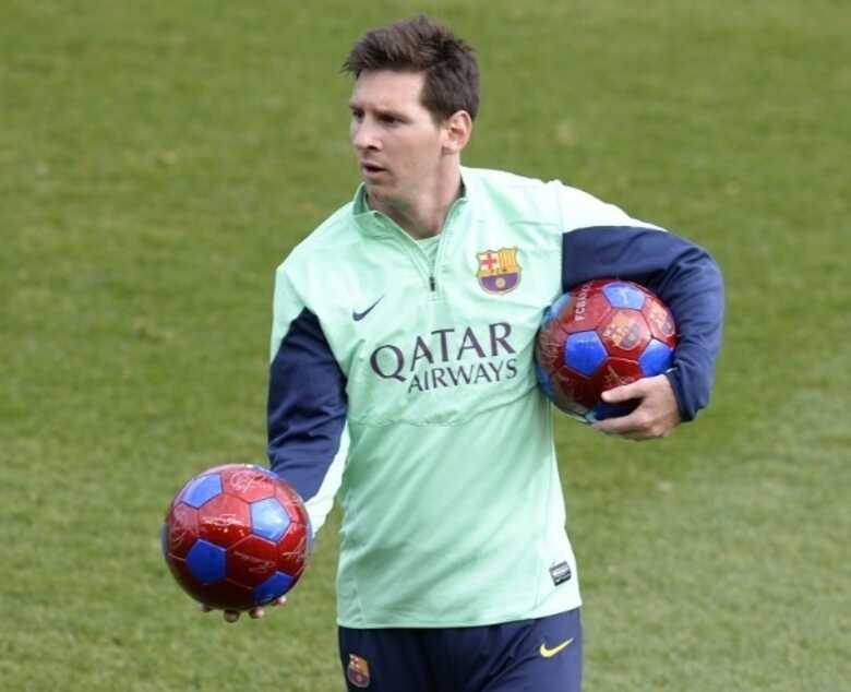 Messi durante o treino aberto do Barcelona. (Foto: AFP Photo/Lluis Gene)