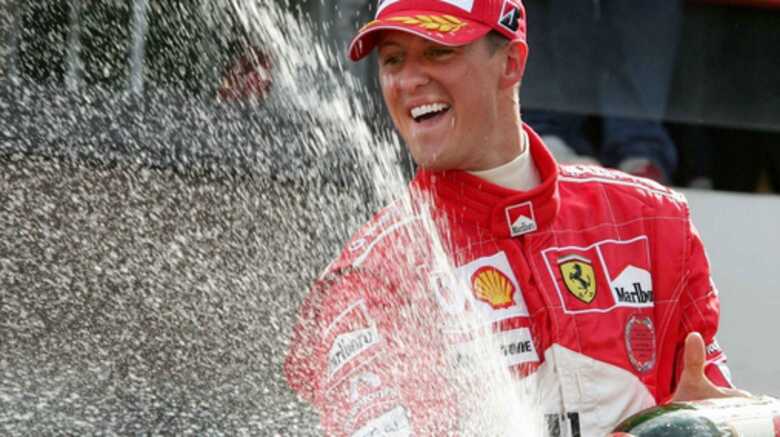Schumacher celebra seu s&eacute;timo t&iacute;tulo mundial no p&oacute;dio do GP da B&eacute;gica. (Foto: Pascal Rossignol/Reuters)