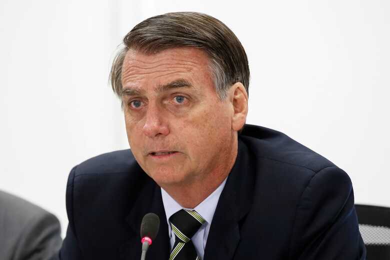 O presidente Jair Bolsonaro se reune com ministros e governador