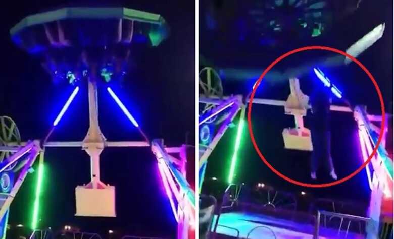 A mulher ainda tenta se segurar no brinquedo no momento em que percebe que vai cair