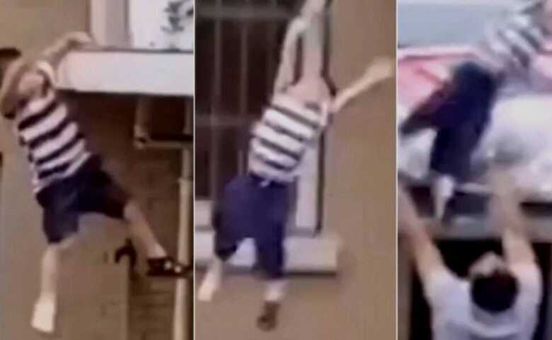 O homem abre os bra&ccedil;os e consegue segurar o menino que caiu do pr&eacute;dio